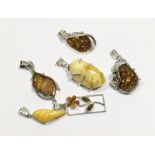 Selection of Large Silver & Amber Pendants