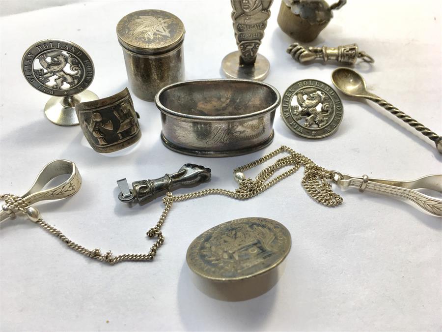 collection of continental silver items includes lidded pill box 1939 seal pendants etc - Image 2 of 3