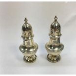 Pair of Silver Pepper Pots Birmingham Silver hallmarks weight 83g filled bases light edge dents