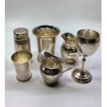 Collection of Small Continental Silver Items includes small cream jugs beakers salt pot etc