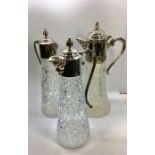 3 Silver plated Claret Jugs 2 with face masks spouts