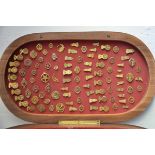 Antique oak cabinet with a collection of various gilded antique pocket watches in a very rare