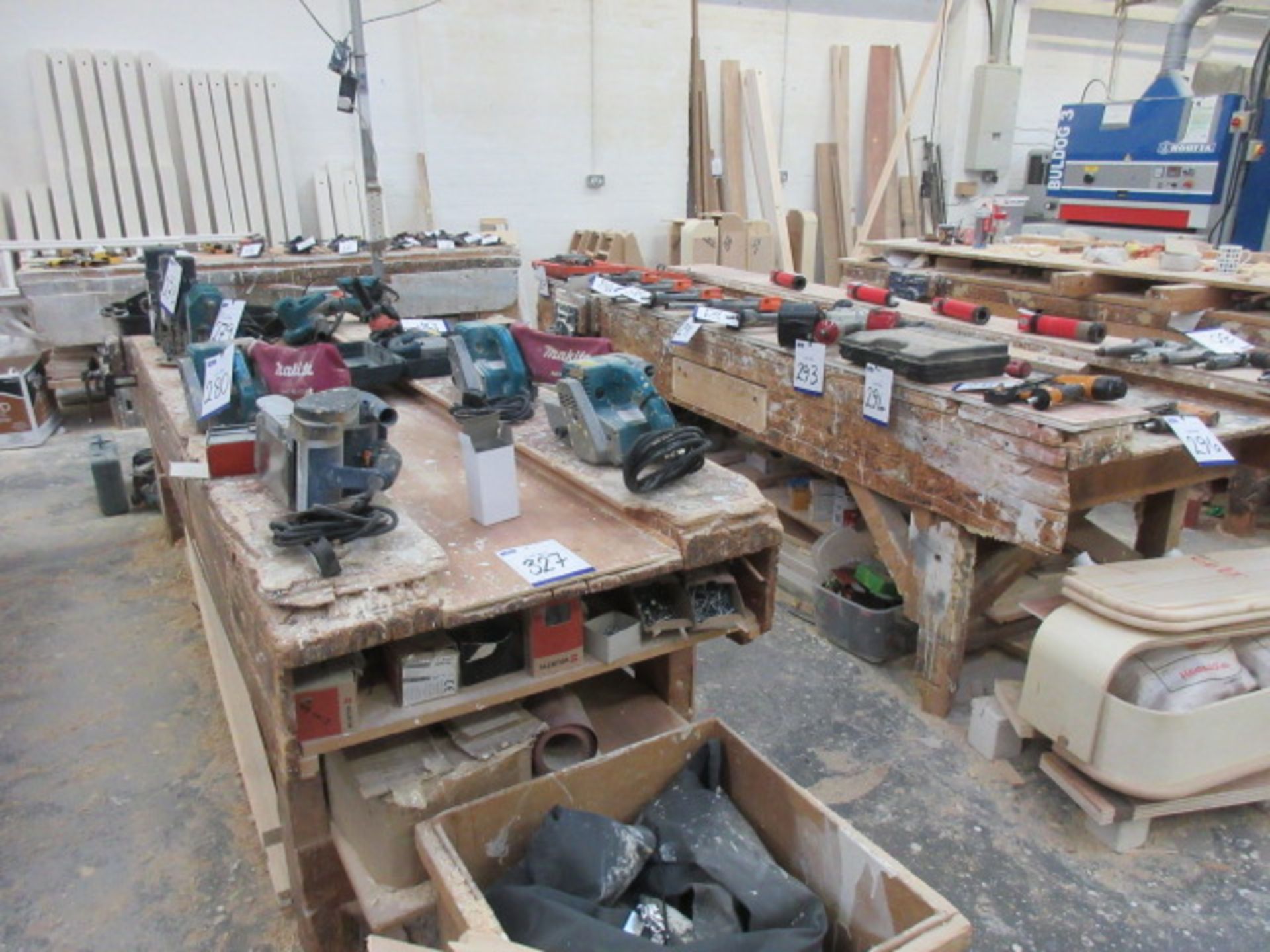 Two wooden joiners benches with vices