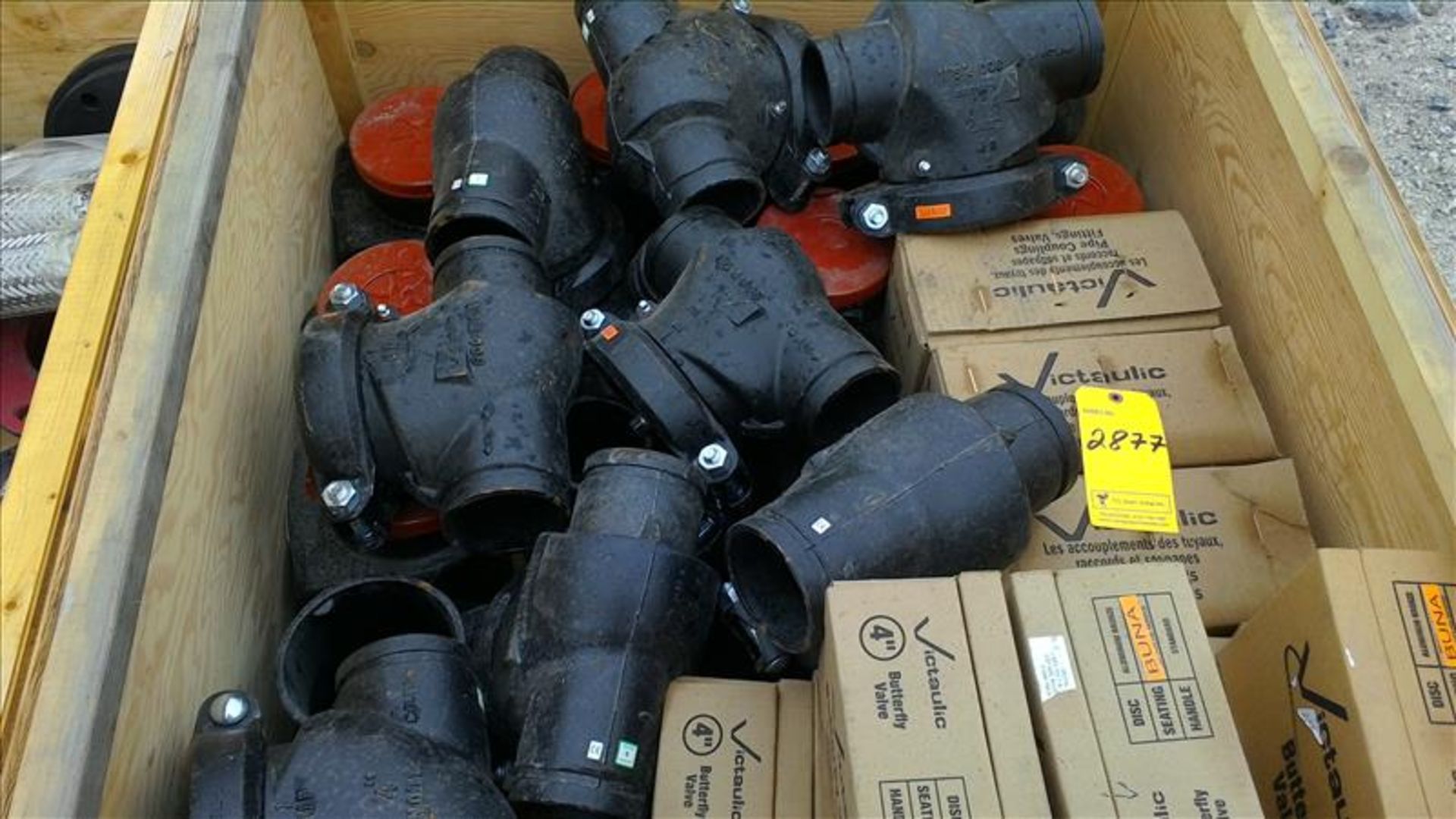 [2877] (1 crate) misc. Victaulic pipe 4 in. butterfly valves & 8 in. backflow valves, etc.