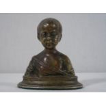 Cast bronze bust of a boy