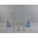 Tall cut glass decanter, set of 6 antique glasses 2 blue glass bottles with stoppers and a cut glass