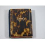 Silk lined antique tortoise shell notebook with gold inlay