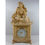 Later figural mantle clock with quartz movement approx. 17" tall