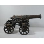 Large vintage cast iron cannon approx. 8" x 18"