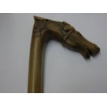 Carved horse head walking stick and 1 other