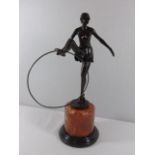 Cast bronze figure of a girl with hoop on a marble plinth appox. 19" tall