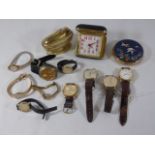 Assortment of watches, lighter etc