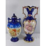 Antique blue floral vase approx 17" tall together with a blue floral jar and cover approx. 13" tall