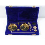 Set of travelling scales in a velvet lined box