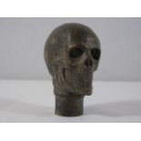 Cast bronze walking stick top in the form of a skull