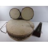 Animal skin drum, bongo drum and metronome