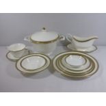 Wedgwood green and gilt Chester pattern 6 place dinner service to include tureens and sauce boats