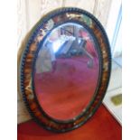Oriental framed oval mirror with laquered decoration