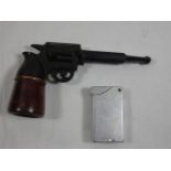 Wood and bakelite pipe in the form of a pistol together with a pocket lighter