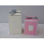 2 Boxed candles 1 pink 1 white