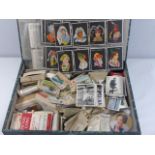 Box of assorted cigarette cards to include planes, footballers, girls of many kinds