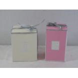 2 Boxed candles 1 pink 1 white