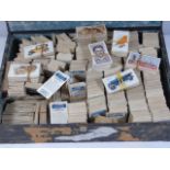 Large box of assorted cigarette cards