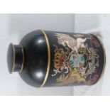 Vintage style tea tin decorated with a coat of arms