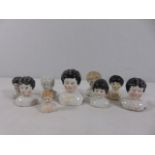 Qty of antique doll heads