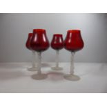 4 Vintage wine glasses with red glass bowls and the stems depicting the figure of a lady