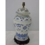 Large blue and white oriental lamp on wooden base approx. overall height 17"