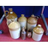 5 Various stoneware flagons, 2 bottles and a jug