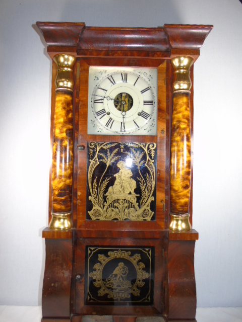 Antique mahogany American wall clock with decorated glass panels complete with 2 weights