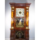 Antique mahogany American wall clock with decorated glass panels complete with 2 weights