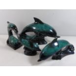 4 Blue mountain dolphin figures