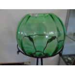 Victorian uranium glass fish bowl on an ornate wrought iron stand approx. 44" tall with a dia of