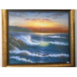 Gilt framed oil on canvas of a sunset sea scape