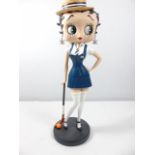 Betty Boop as a school girl with a hockey stick approx. 12.5"