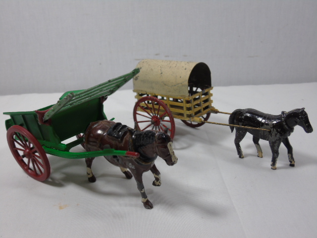 4 Vintage lead horse and cart figures