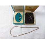 9ct Gold amethyst set heart pendant on 9ct gold chain together with a silver snake link necklace and