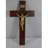 Antique carved ivory crucifix with a carved ivory indri plaque on an inlaid ivory cross