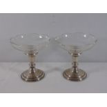 Pair of sterling silver and glass sweet meat dishes