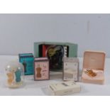 Jean Paul Gaultier miniature perfumes and a pack of playing cards