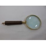 Wooden handled magnifying glass