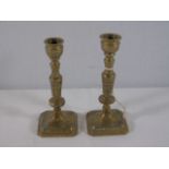 Pair of antique brass candlesticks approx 6" tall