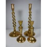 Pair of brass candlesticks with twisted stem approx. 12" Pair of brass candlesticks approx. 6.5"