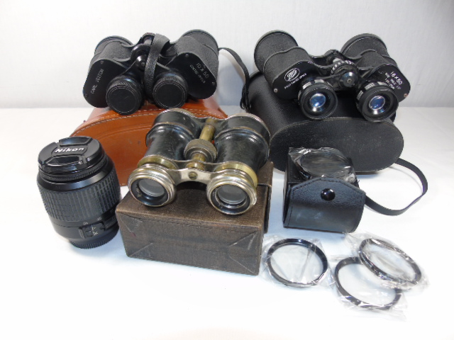 2 Pairs of binoculars, pr opera glasses and 2 camera lens inc Nikon