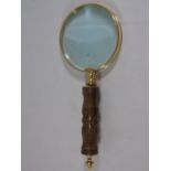 Wooden handled magnifying glass