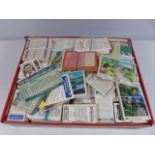 Large box of mixed cigarette and tea cards