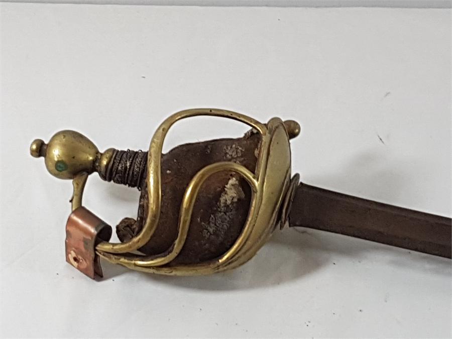 Antique Military sword with brass hand guard
